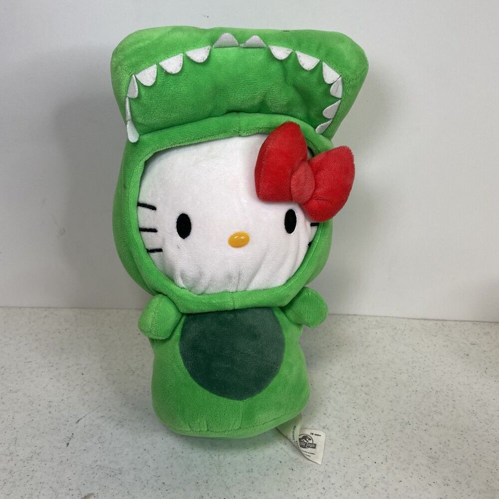 Universal Hello Kitty Green Dinosaur Plush with Red Bow